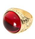 "BAGUE DOREE AVEC PIERRE ROUGE"