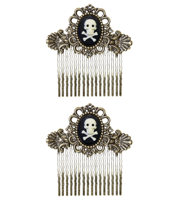 Paire de " PEIGNES A CHEVEUX TETE DE MORT ANTIQUE"