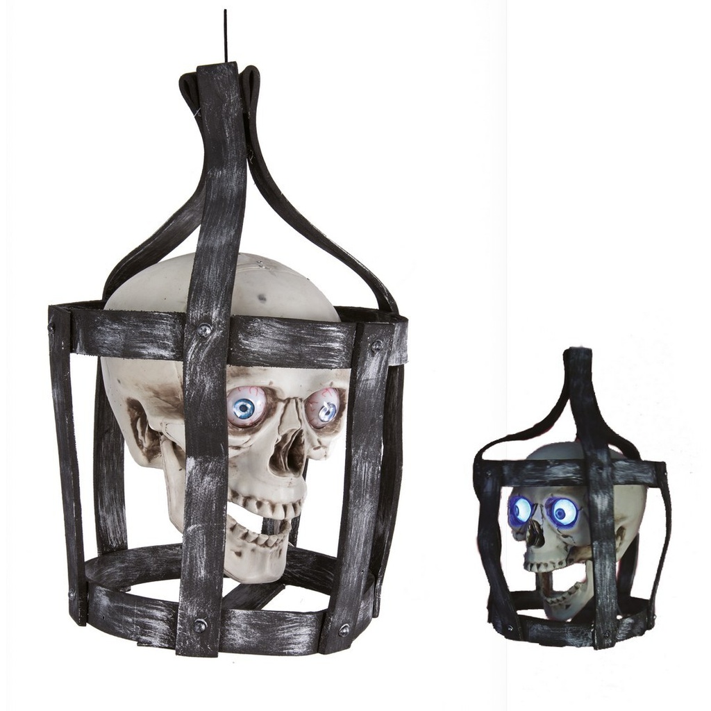 [PTC-11436] Tête de mort en cage - animé, sonore, lumineux - 44cm