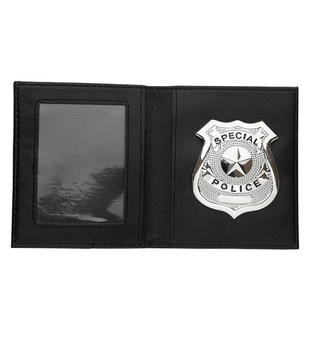 [05859] "BADGE DE POLICE DANS UNE POCHETTE"